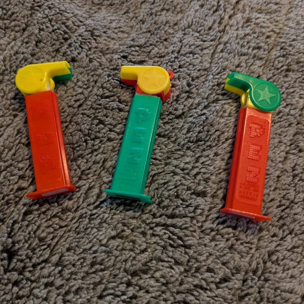 3 whistle pez dispensers with feet